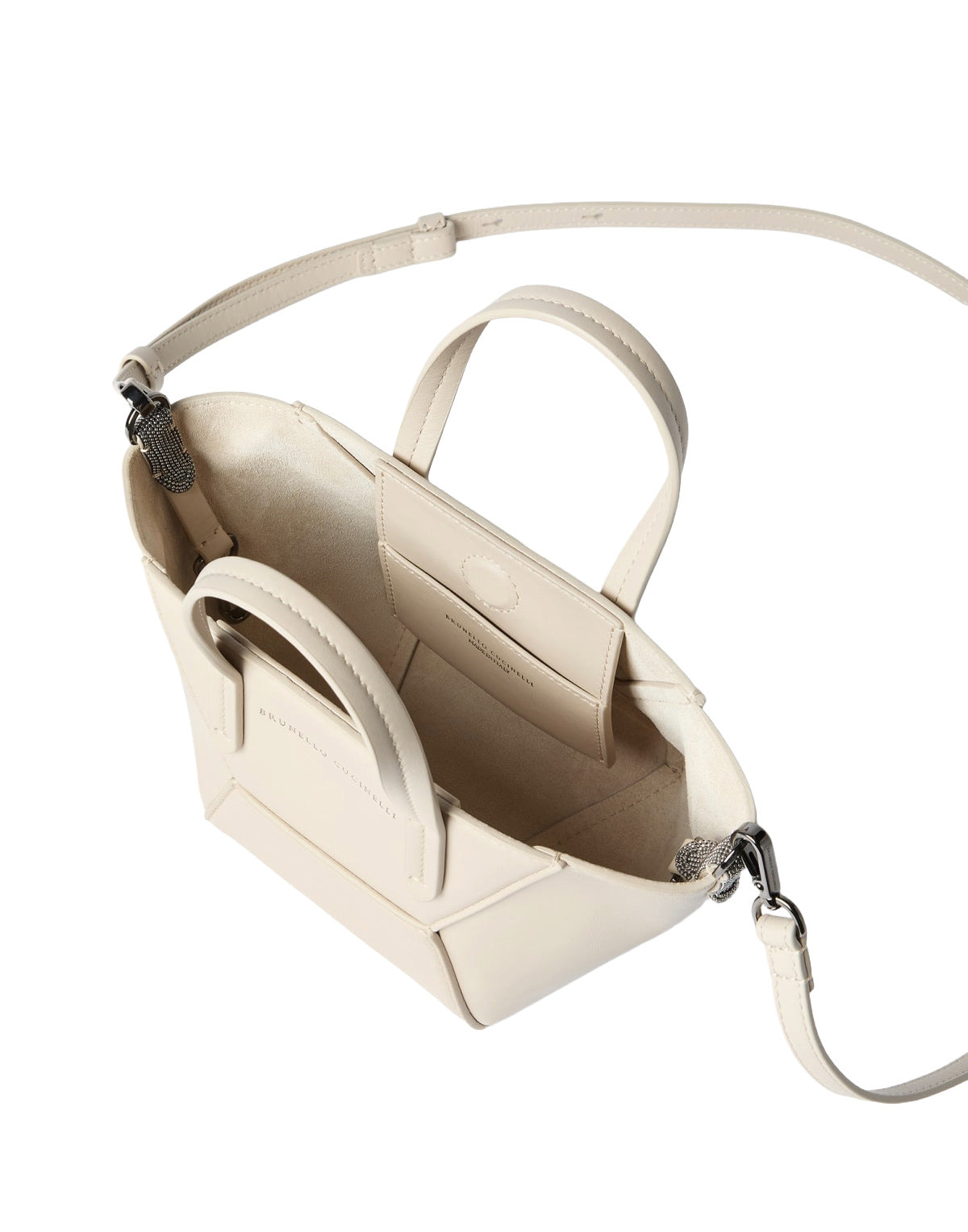 Beige handbag with a strap on a white background