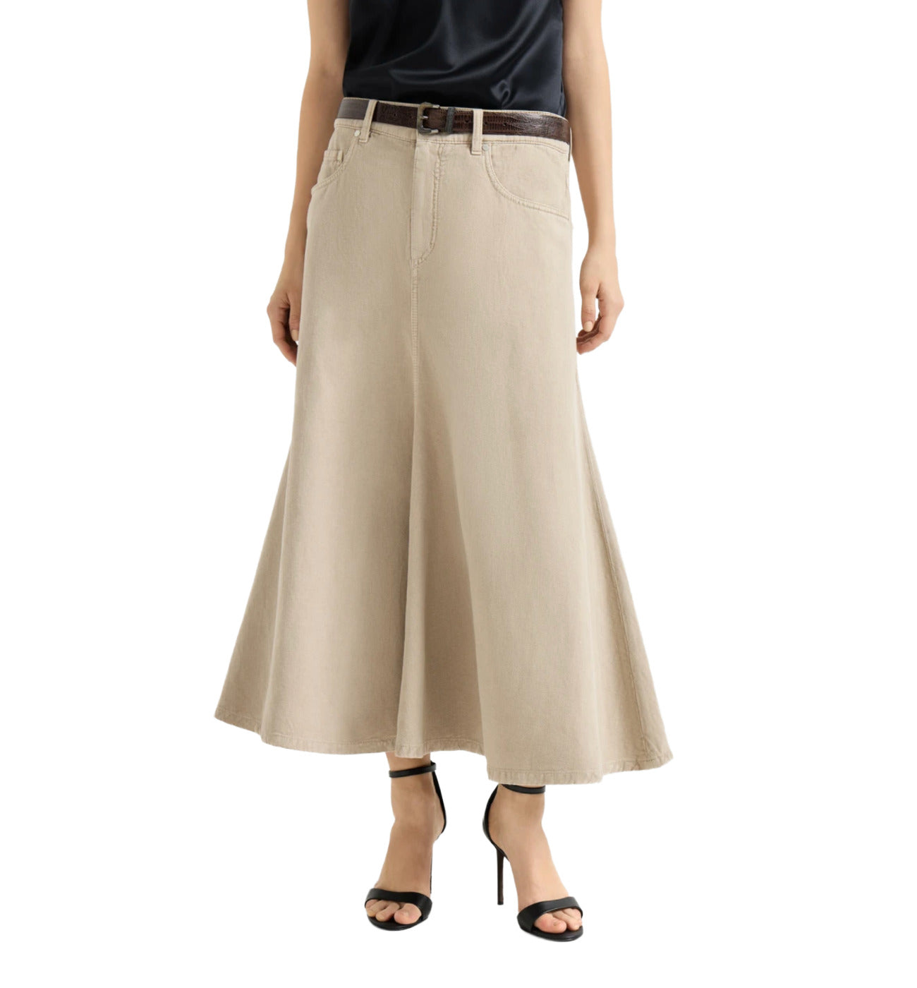 Beige skirt worn by a person on a white background