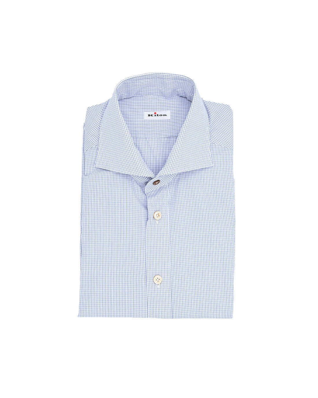 Blue and white dress shirt neatly folded in front of a white backdrop