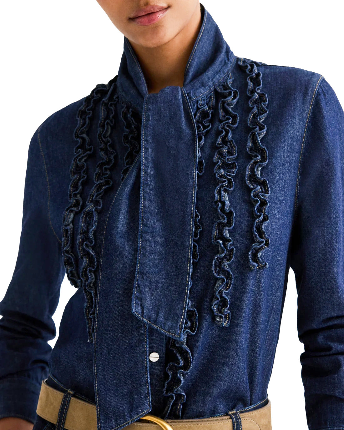 Blue denim jacket with ruffled details on a white background