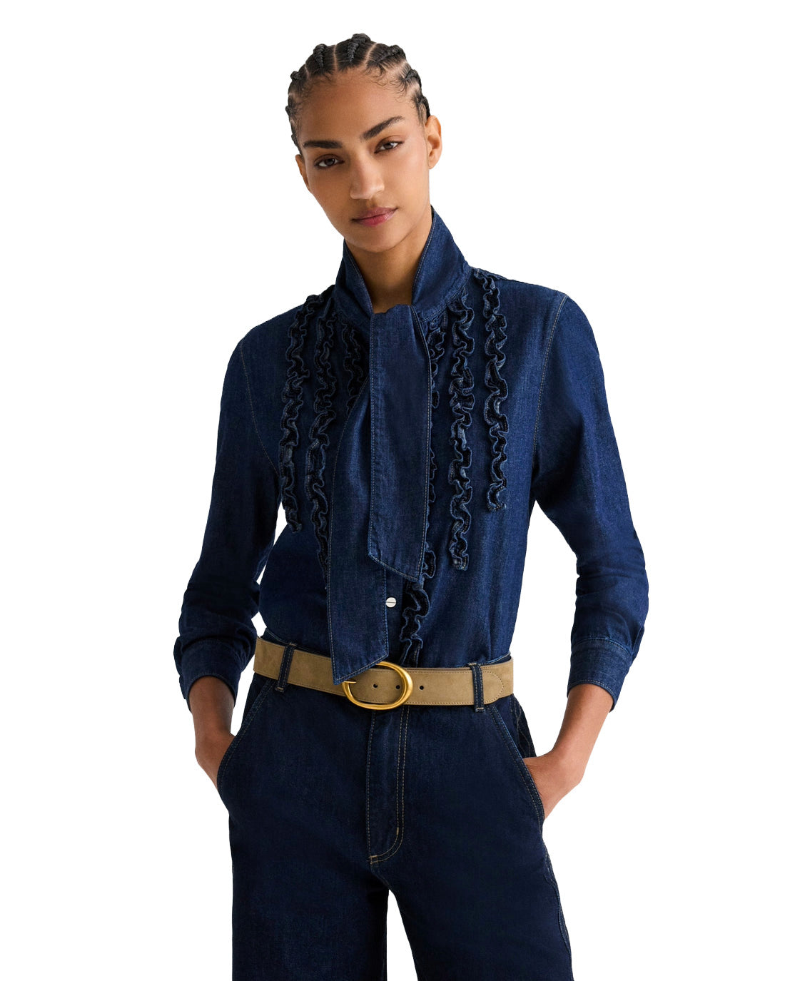 Person wearing a blue denim outfit with a scarf and belt on a white background