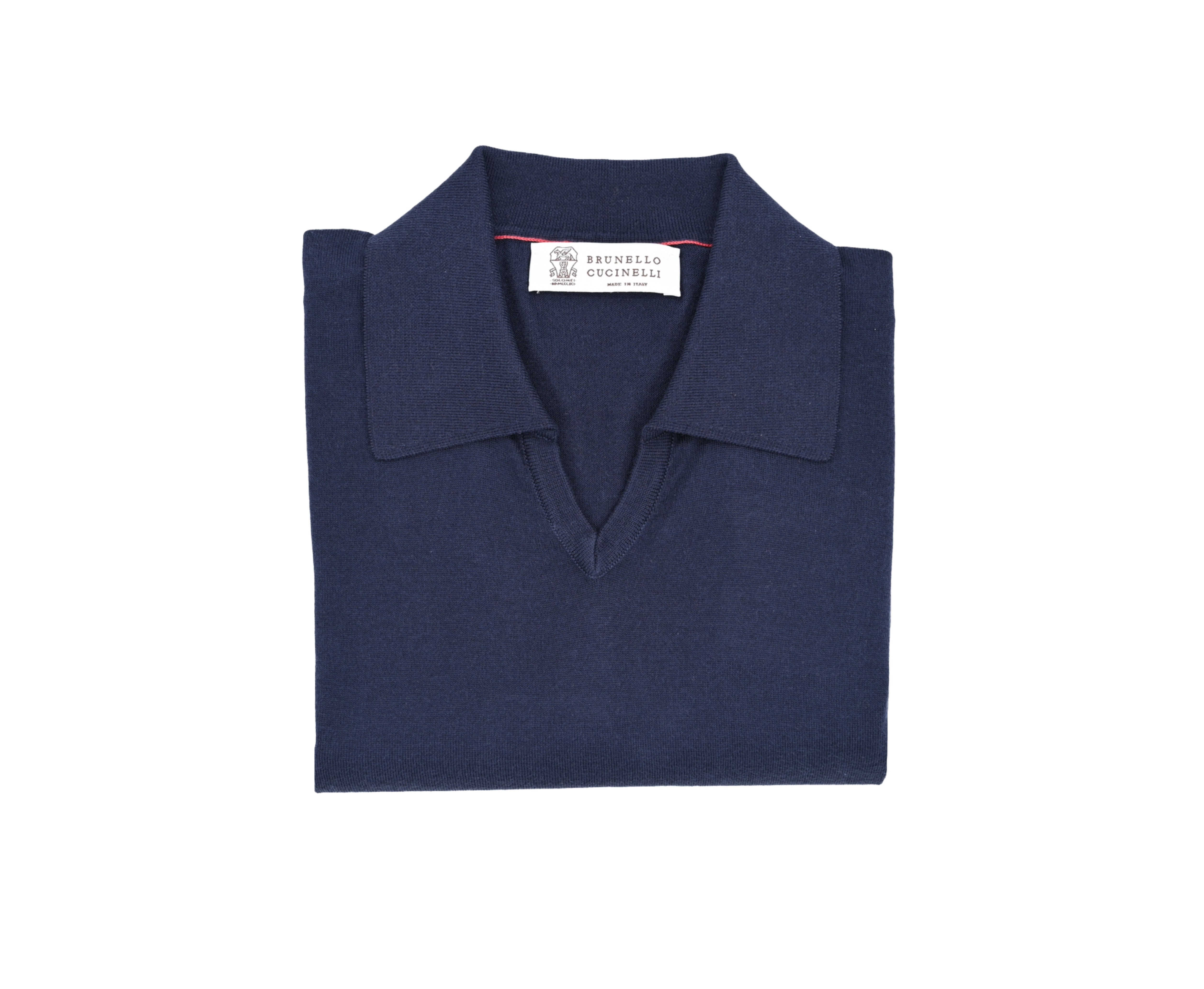 Folded navy blue polo shirt with a brand label on a white background